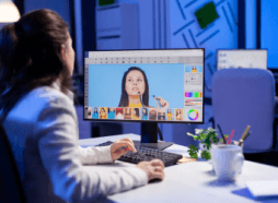 Woman sitting in front of a laptop